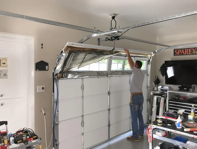 Garage door section replacement by Greenwich Garage Door Repair in Greenwich