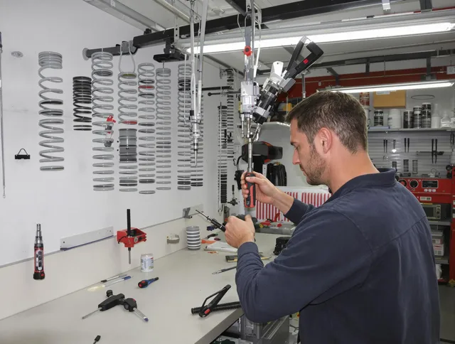 Greenwich Garage Door Repair safety certified technician performing precision spring replacement in Greenwich