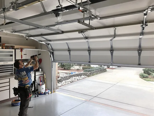 Garage door track repair service by Greenwich Garage Door Repair in Greenwich